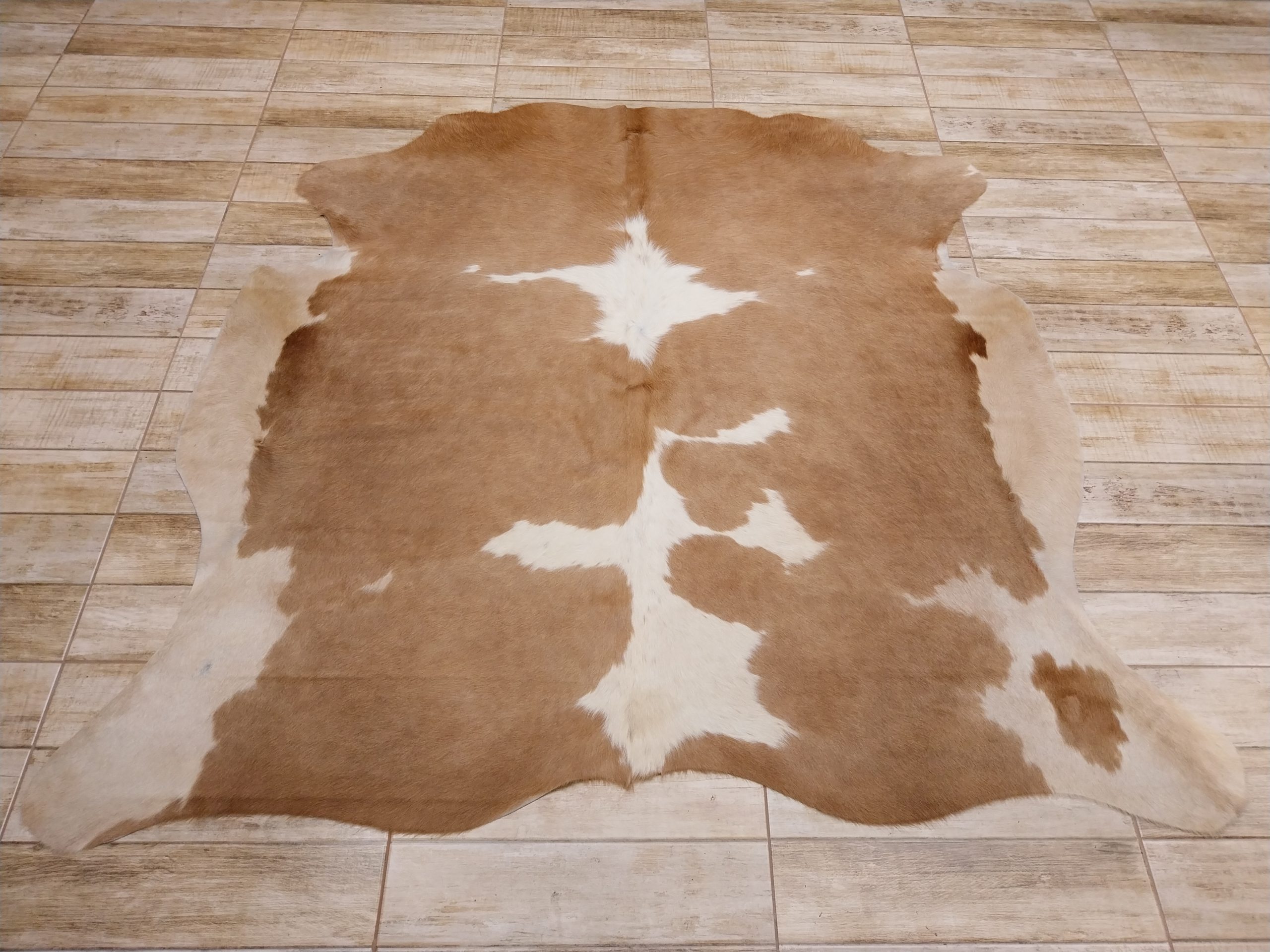Alfombra vacuno