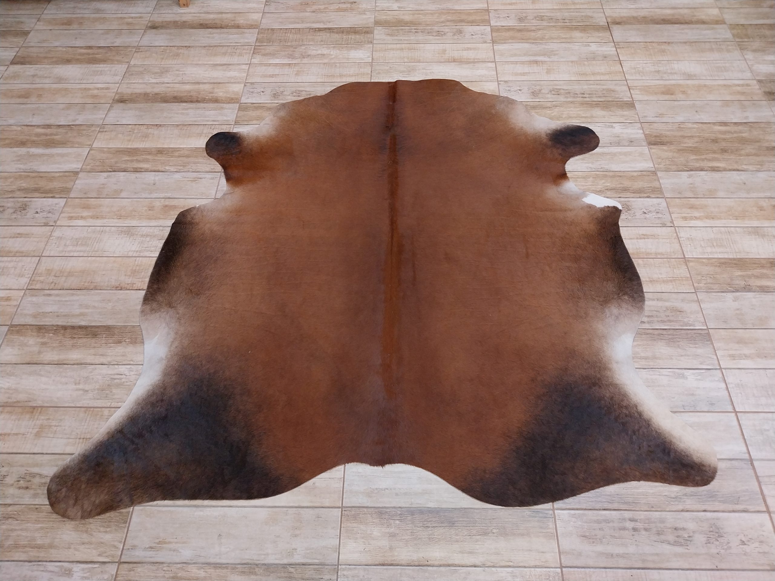 Alfombra vacuno