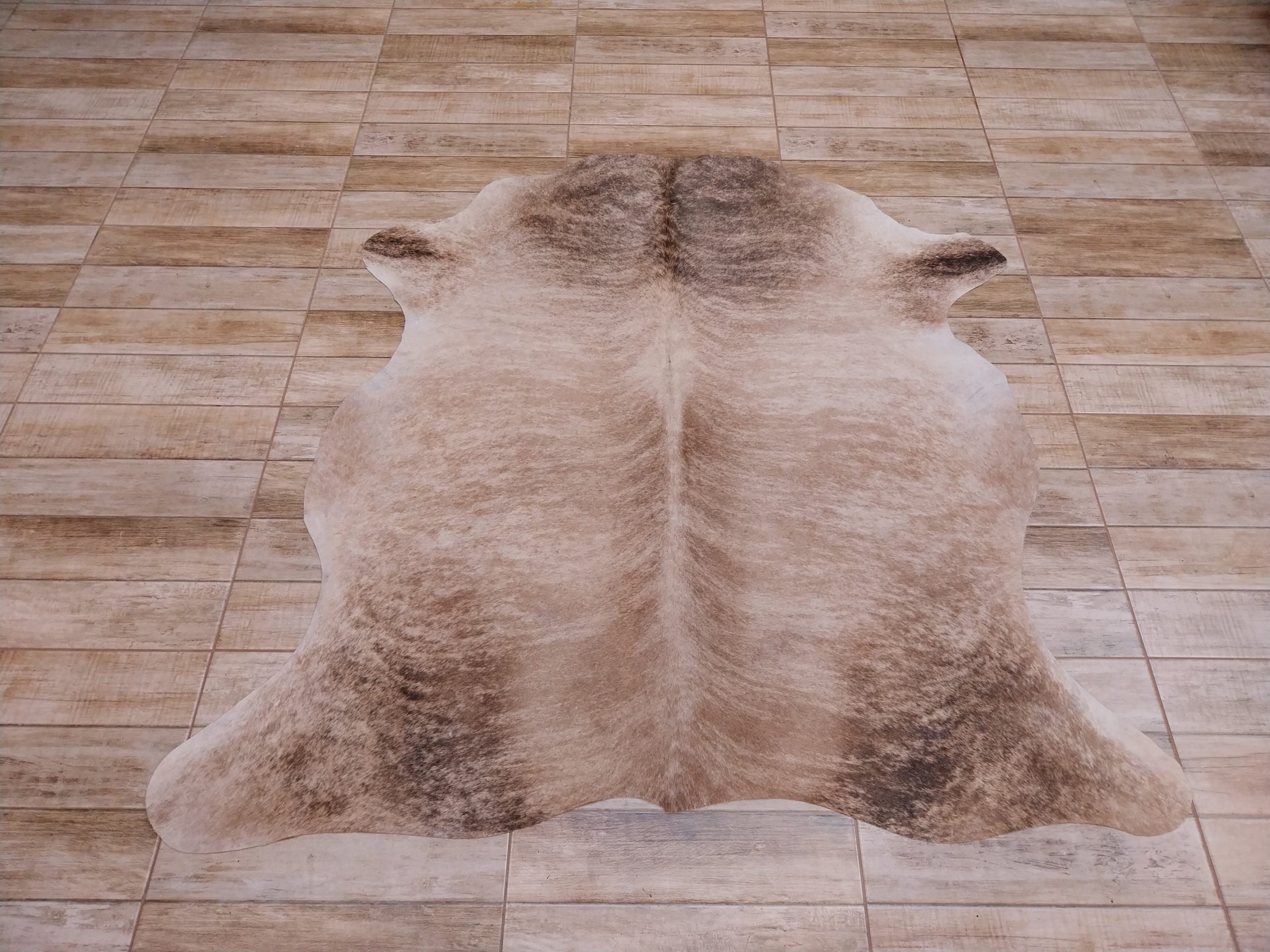 Alfombra vacuno
