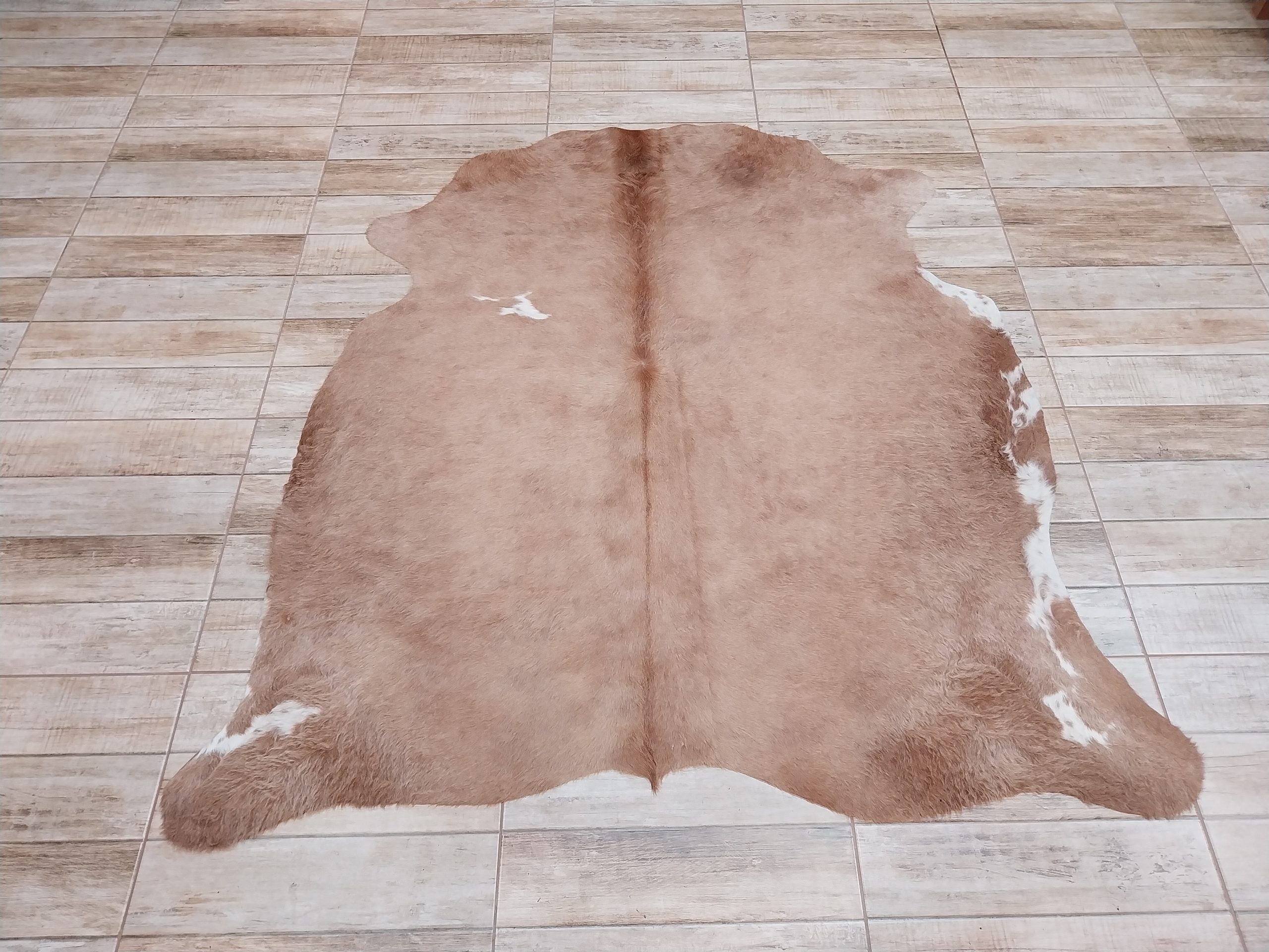 Alfombra vacuno