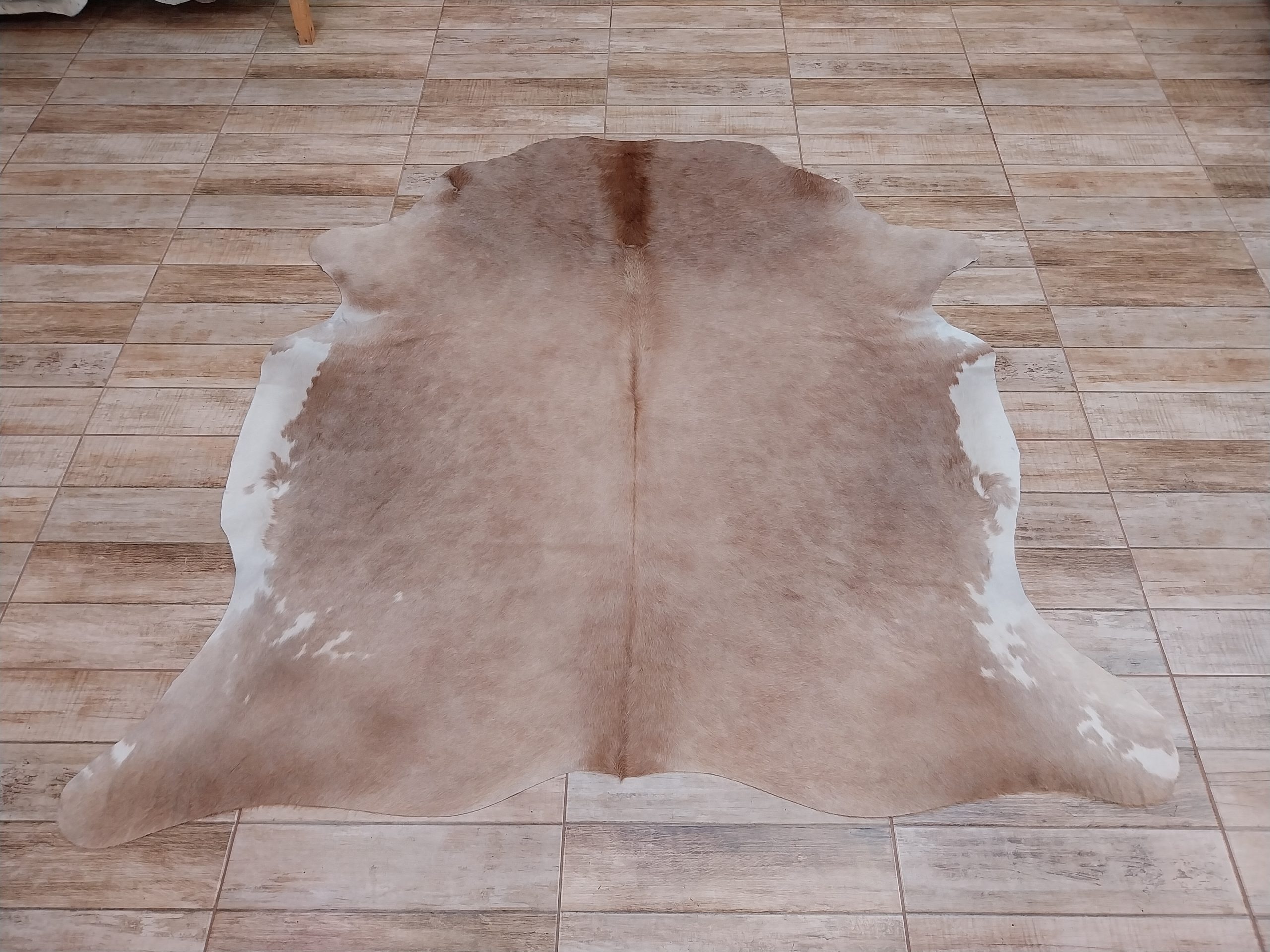 Alfombra vacuno
