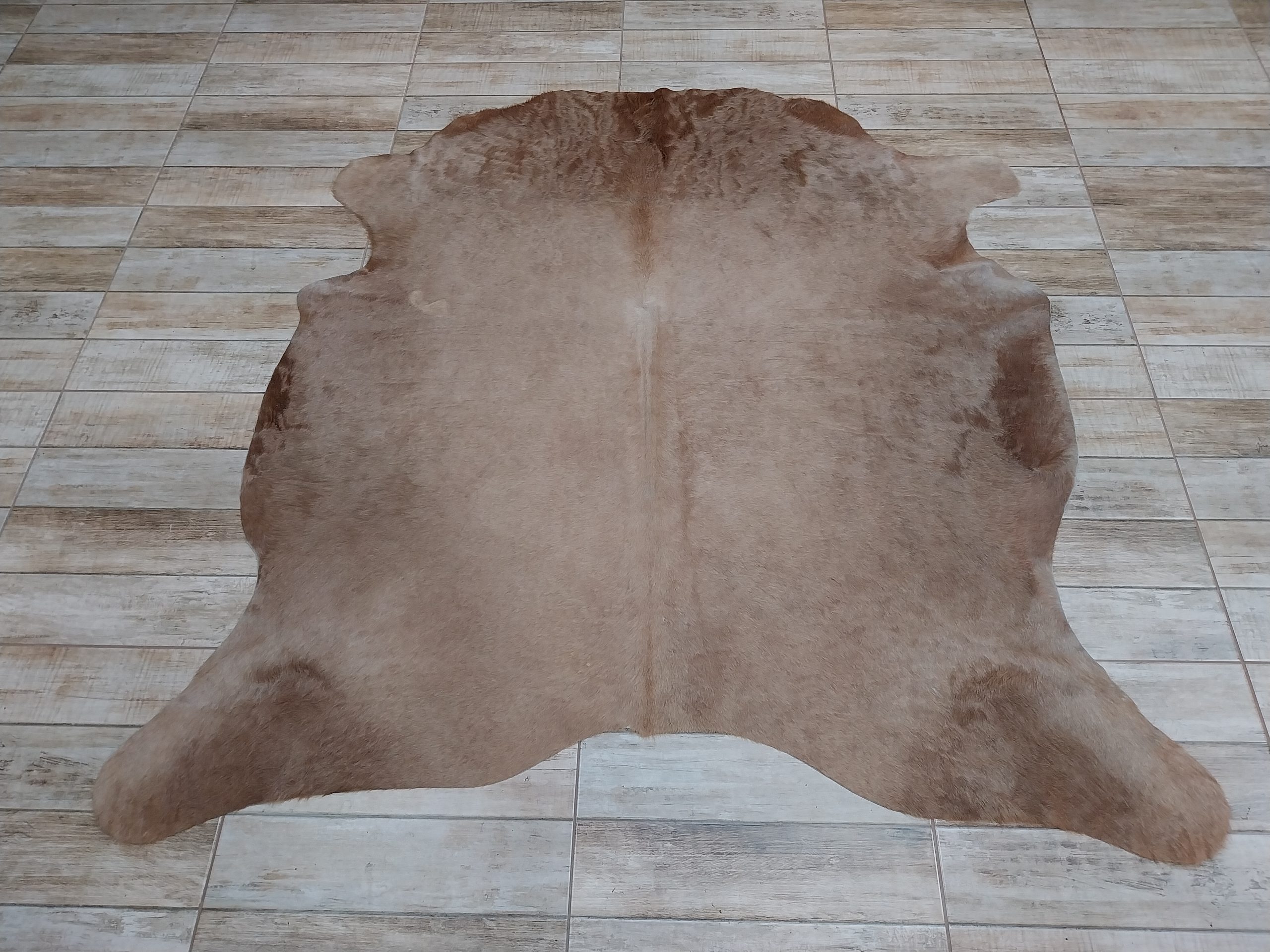 Alfombra vacuno